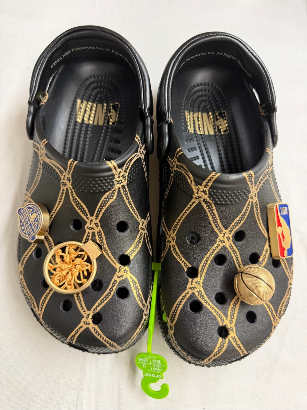 Crocs Black and Gold Patterned Clog Shoes